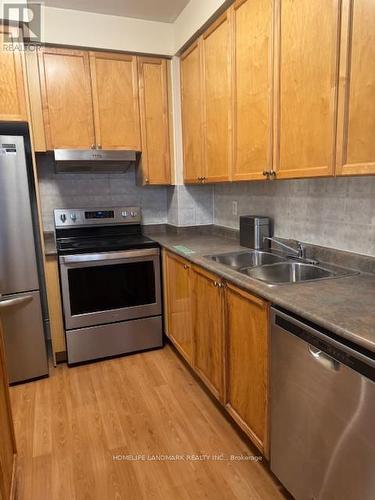 119 - 3888 Duke Of York Boulevard, Mississauga, ON - Indoor Photo Showing Kitchen With Double Sink