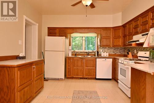 27 Meadow Street, Whitewater Region, ON - Indoor Photo Showing Kitchen With Double Sink