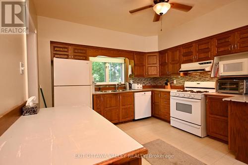 27 Meadow Street, Whitewater Region, ON - Indoor Photo Showing Kitchen With Double Sink