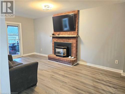 486 E Dicenzo Drive, Hamilton, ON - Indoor Photo Showing Living Room With Fireplace