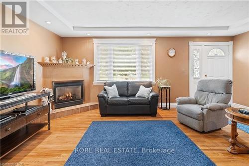 552 Fairview Road, Fort Erie (334 - Crescent Park), ON - Indoor Photo Showing Living Room With Fireplace