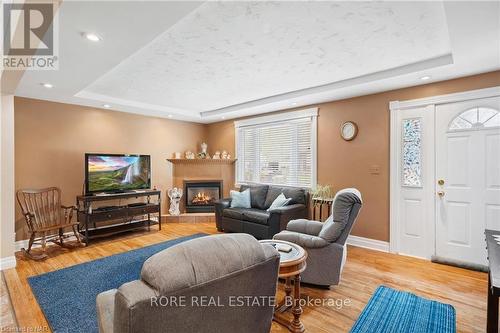 552 Fairview Road, Fort Erie (334 - Crescent Park), ON - Indoor Photo Showing Living Room With Fireplace