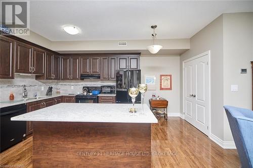 427 - 8111 Forest Glen Drive, Niagara Falls (208 - Mt. Carmel), ON - Indoor Photo Showing Kitchen