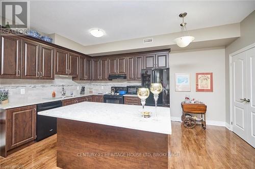 427 - 8111 Forest Glen Drive, Niagara Falls (208 - Mt. Carmel), ON - Indoor Photo Showing Kitchen