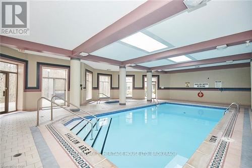 427 - 8111 Forest Glen Drive, Niagara Falls (208 - Mt. Carmel), ON - Indoor Photo Showing Other Room With In Ground Pool