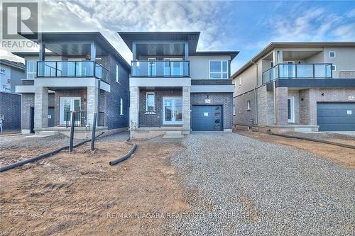 3245 Dominion Road, Fort Erie (335 - Ridgeway), ON - Outdoor With Balcony With Facade