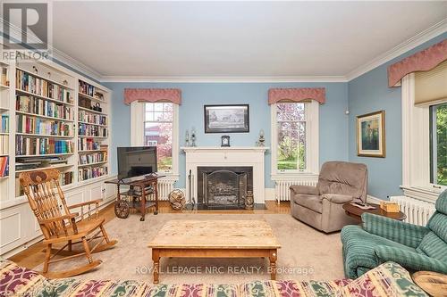 1171 Mcnab Road, Niagara-On-The-Lake (102 - Lakeshore), ON - Indoor Photo Showing Living Room With Fireplace