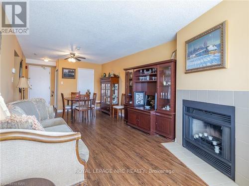 314 - 78 Roehampton Avenue, St. Catharines (444 - Carlton/Bunting), ON - Indoor Photo Showing Living Room With Fireplace