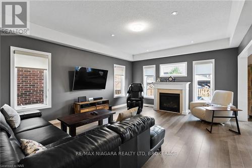 7 Cannery Drive, Niagara-On-The-Lake (105 - St. Davids), ON - Indoor Photo Showing Living Room With Fireplace