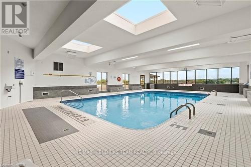 407 - 7 Gale Crescent, St. Catharines (450 - E. Chester), ON - Indoor Photo Showing Other Room With In Ground Pool