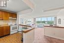 407 - 7 Gale Crescent, St. Catharines (450 - E. Chester), ON  - Indoor Photo Showing Kitchen With Double Sink 