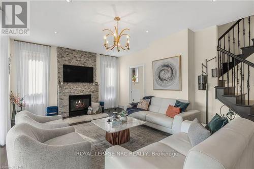 14 Tuscany Court, St. Catharines (453 - Grapeview), ON - Indoor Photo Showing Living Room With Fireplace