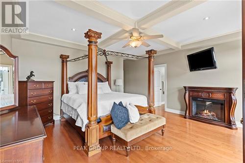 63 Tanbark Road, Niagara-On-The-Lake (105 - St. Davids), ON - Indoor Photo Showing Bedroom With Fireplace