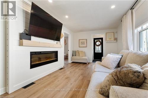 28 Elberta Street, St. Catharines (445 - Facer), ON - Indoor Photo Showing Living Room With Fireplace