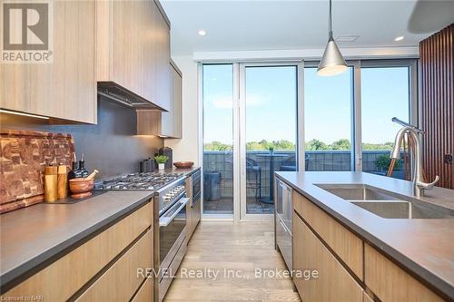 604 - 57 Lakeport Road, St. Catharines (438 - Port Dalhousie), ON - Indoor Photo Showing Kitchen With Double Sink With Upgraded Kitchen