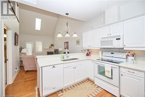 10 - 8142 Costabile Drive, Niagara Falls (213 - Ascot), ON - Indoor Photo Showing Kitchen With Double Sink