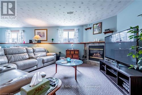 19 Windle Village Crescent, Thorold (556 - Allanburg/Thorold South), ON - Indoor Photo Showing Living Room With Fireplace