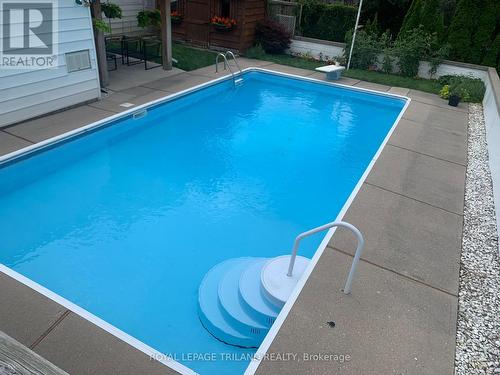 photo from the Summer - 201 Elliott Street, London, ON - Outdoor With In Ground Pool