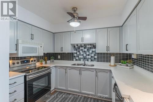 110 - 454 Centre Street S, Oshawa (Central), ON - Indoor Photo Showing Kitchen With Double Sink