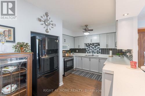 110 - 454 Centre Street S, Oshawa (Central), ON - Indoor Photo Showing Kitchen With Double Sink