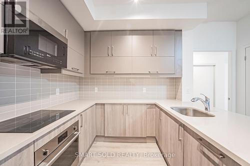 504 - 38 Simcoe Promenade, Markham, ON - Indoor Photo Showing Kitchen With Upgraded Kitchen