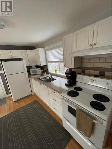 Suite - 952 Walfred Rd, Langford, BC - Indoor Photo Showing Kitchen With Double Sink