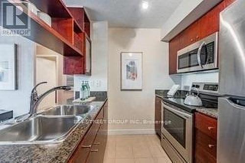 1711 - 381 Front Street W, Toronto, ON - Indoor Photo Showing Kitchen With Double Sink