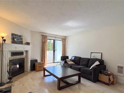 116-290 Regina Ave, Saanich, BC - Indoor Photo Showing Living Room With Fireplace