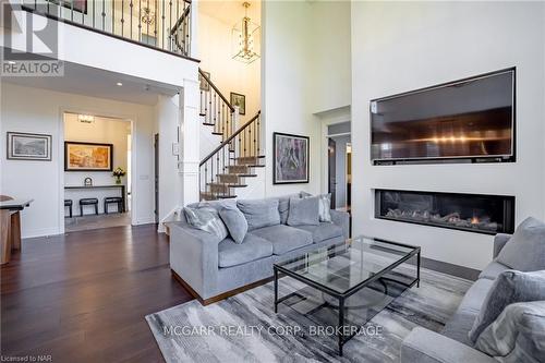 1 Tuscany Court, St. Catharines (453 - Grapeview), ON - Indoor Photo Showing Living Room With Fireplace