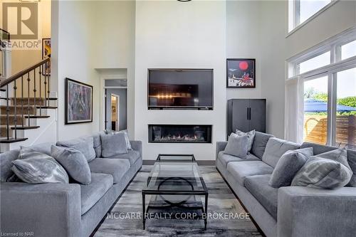 1 Tuscany Court, St. Catharines (453 - Grapeview), ON - Indoor Photo Showing Living Room With Fireplace