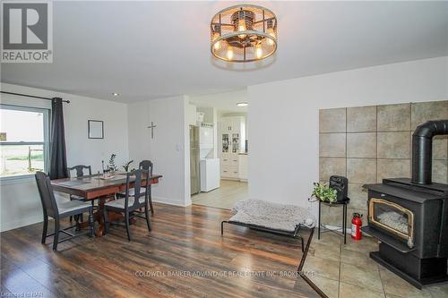 4721 Rainham Road, Haldimand (Dunnville), ON - Indoor Photo Showing Dining Room With Fireplace