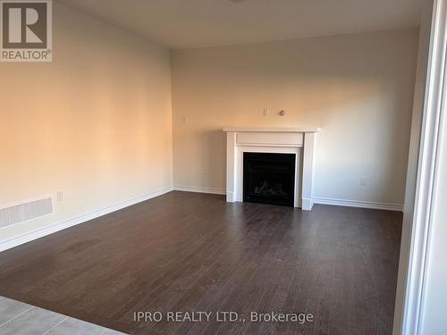 211 Ronald Guscott Street, Oshawa, ON - Indoor Photo Showing Living Room With Fireplace