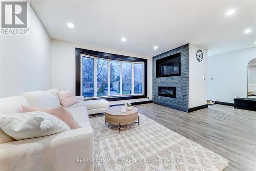 25 George Street, New Tecumseth, ON - Indoor Photo Showing Living Room With Fireplace