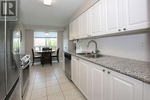 215 - 55 Via Rosedale Avenue, Brampton, ON - Indoor Photo Showing Kitchen With Double Sink With Upgraded Kitchen