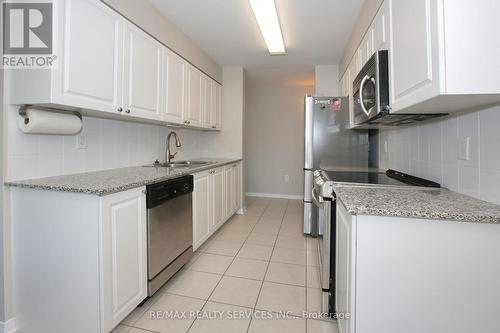 215 - 55 Via Rosedale Avenue, Brampton, ON - Indoor Photo Showing Kitchen With Upgraded Kitchen