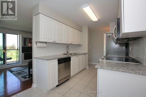 215 - 55 Via Rosedale Avenue, Brampton, ON - Indoor Photo Showing Kitchen