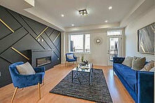 Caledon, ON - Indoor Photo Showing Living Room With Fireplace