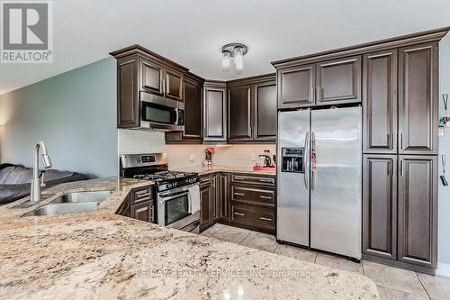 100 Acorn Way, Cambridge, ON - Indoor Photo Showing Kitchen With Double Sink With Upgraded Kitchen