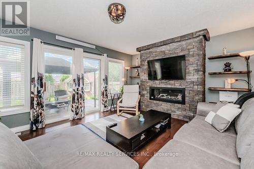 100 Acorn Way, Cambridge, ON - Indoor Photo Showing Living Room With Fireplace