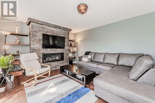 100 Acorn Way, Cambridge, ON - Indoor Photo Showing Living Room With Fireplace