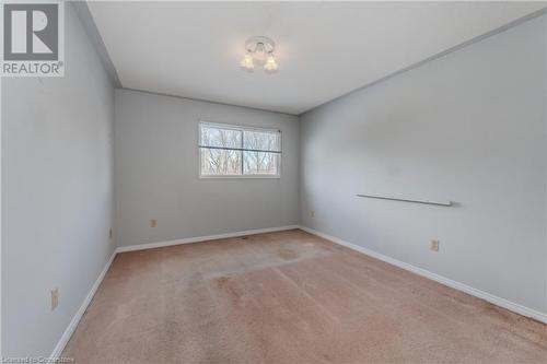 View of carpeted spare room - 10 Fenwick Court, Kitchener, ON 