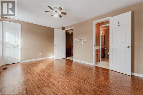 Spare room featuring light wood-type flooring and ceiling fan - 10 Fenwick Court, Kitchener, ON 