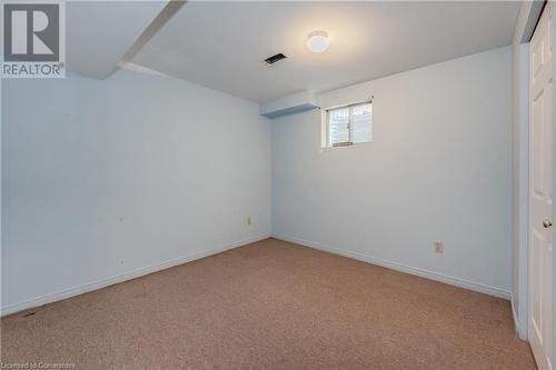 Unfurnished room featuring light carpet - 10 Fenwick Court, Kitchener, ON 