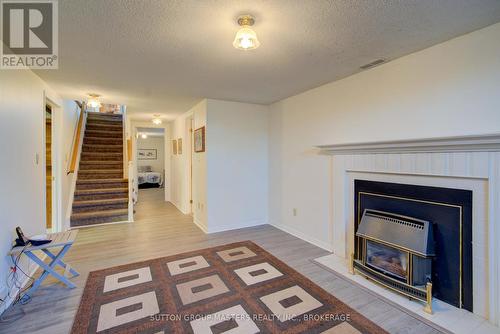 11 Hawley Court, Loyalist (Bath), ON - Indoor Photo Showing Living Room With Fireplace