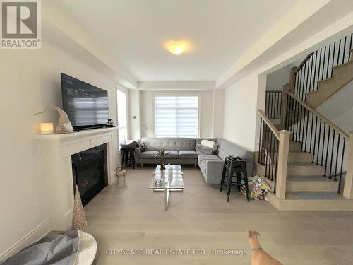 4 Pond View Gate, Hamilton, ON - Indoor Photo Showing Living Room With Fireplace