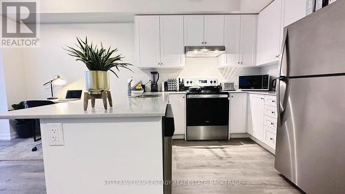 27 - 7789 Kalar Road, Niagara Falls (222 - Brown), ON - Indoor Photo Showing Kitchen