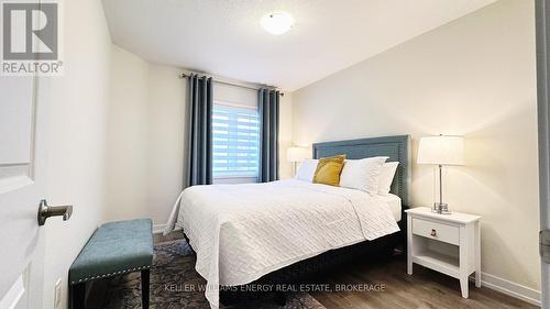 27 - 7789 Kalar Road, Niagara Falls (222 - Brown), ON - Indoor Photo Showing Bedroom