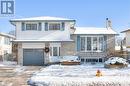 Tri-level home featuring a garage - 19 Halifax Drive, Kitchener, ON  - Outdoor With Facade 