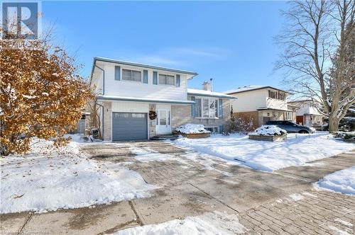 View of front of house featuring a garage - 19 Halifax Drive, Kitchener, ON - Outdoor With Facade