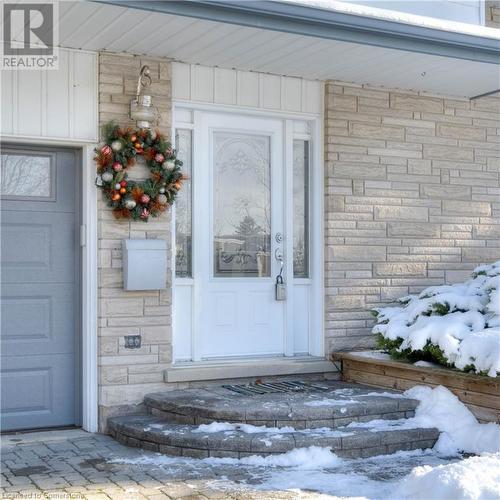 View of snow covered property entrance - 19 Halifax Drive, Kitchener, ON - Outdoor